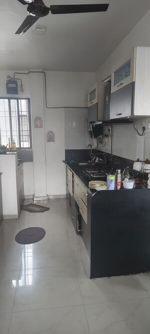 Kitchen in 2 BHK Apartment at Divya Heights, Pimple Saudagar – for Rent