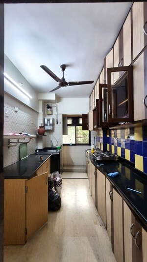 Kitchen in 2 BHK Apartment at Serenity Complex, Andheri West – for Rent