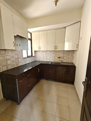 Kitchen in 2 BHK Apartment at Unitech Uniworld Gardens 2, Sector 47 – for Rent