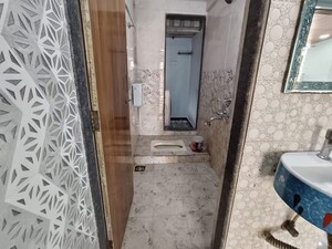 Bathroom in 1 BHK Apartment at Shivalaya Aniruddha Heights, Kamothe Sector 34 – for Sale