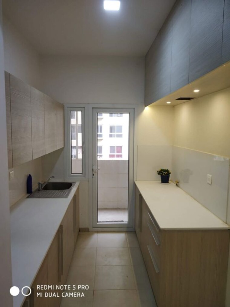 Kitchen, bhartiya-nikoo-homes 3 Bedroom 1595 Sq.Ft. Apartment In Thanisandra Main Road Bangalore 10719045
