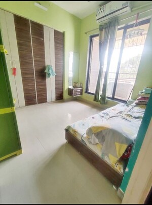 Bedroom in 1 BHK Apartment at Kavya Hill View CHS, Anand Nagar – for Sale