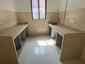 Kitchen in 2 BHK Apartment at Tejukaya Esperanza, Lalbaug – for Sale