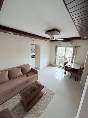 Living Room in 1 BHK Apartment at Raunak Bliss, Ghodbunder Road – for Rent