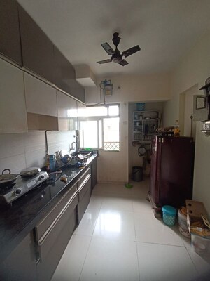 Kitchen in 2 BHK Apartment at Squarefeet Ace Square, Thane West – for Rent