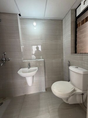 Bathroom in 1.5 BHK Apartment at Runwal Gardens, Dombivli East – for Rent