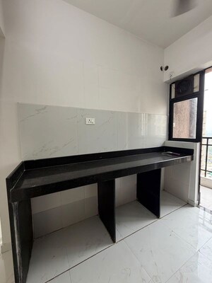 Kitchen in 1.5 BHK Apartment at Runwal Gardens, Dombivli East – for Rent