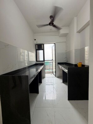 Team Area in 1.5 BHK Apartment at Runwal Gardens, Dombivli East – for Rent