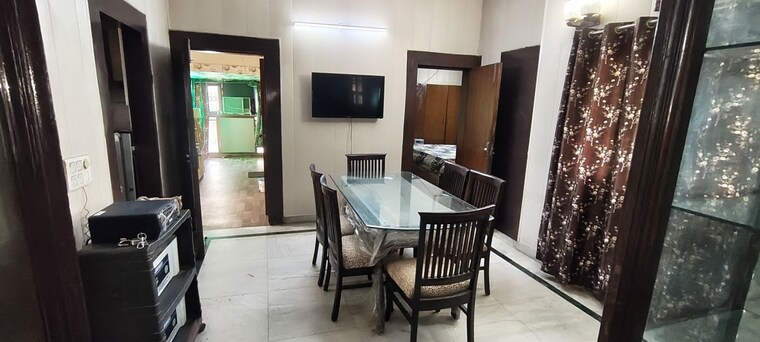 Dining area, omaxe-designer-villas-mayfield-garden 3 Bedroom 2200 Sq.Ft. Builder Floor In Sector 51 Gurgaon 10719257