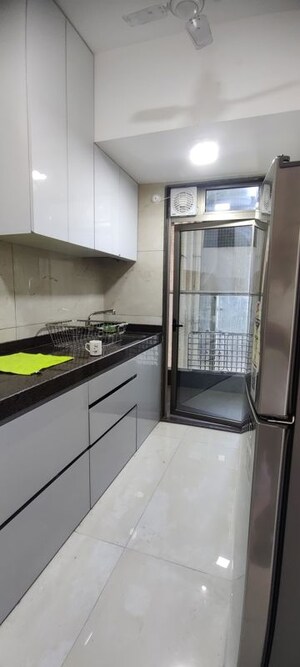 Kitchen in 2 BHK Apartment at Lokhandwala Residency, Worli – for Sale