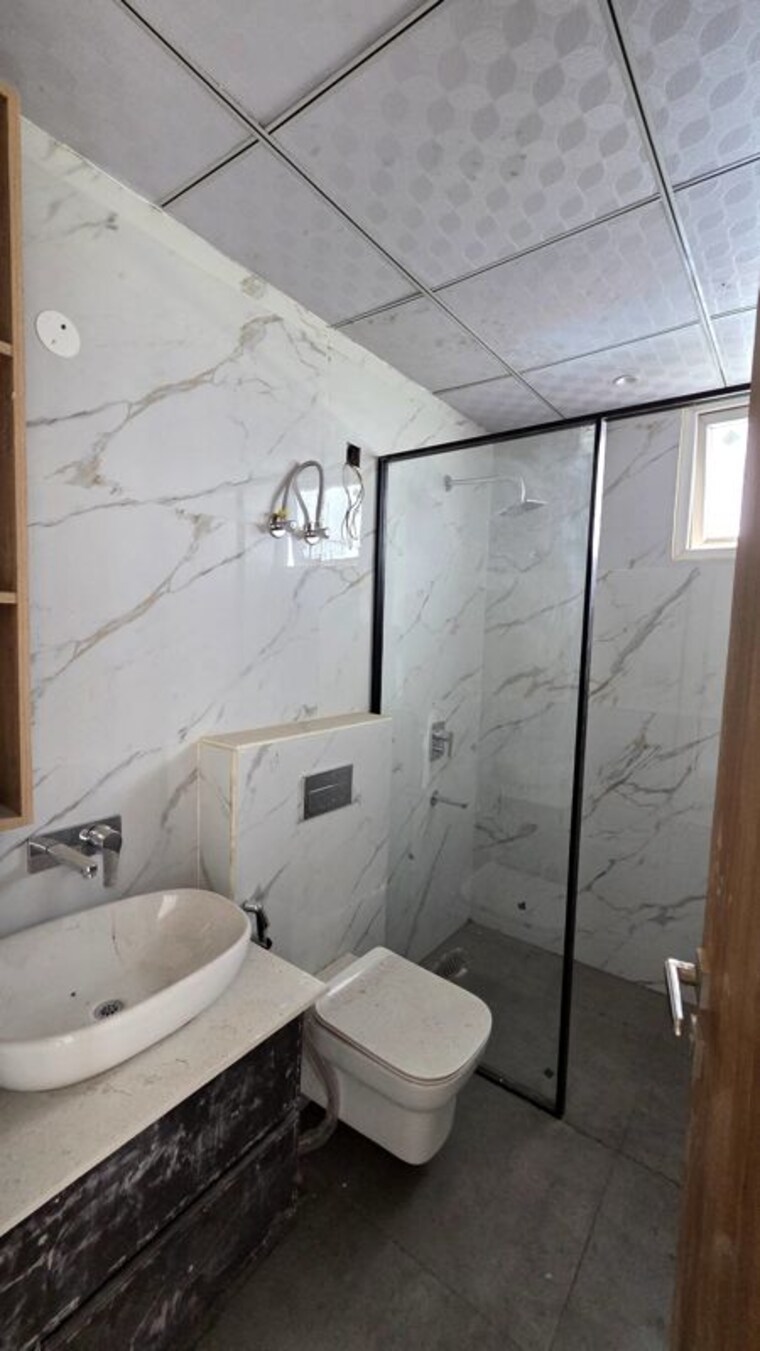 Bathroom, the-ananta-aspire 3 Bedroom 1843 Sq.Ft. Apartment In Utrathiya Zirakpur 10719285