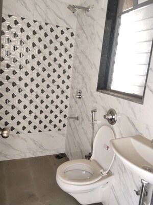 Bathroom in 2 BHK Apartment at Dynamix Avanya, Dahisar East – for Rent