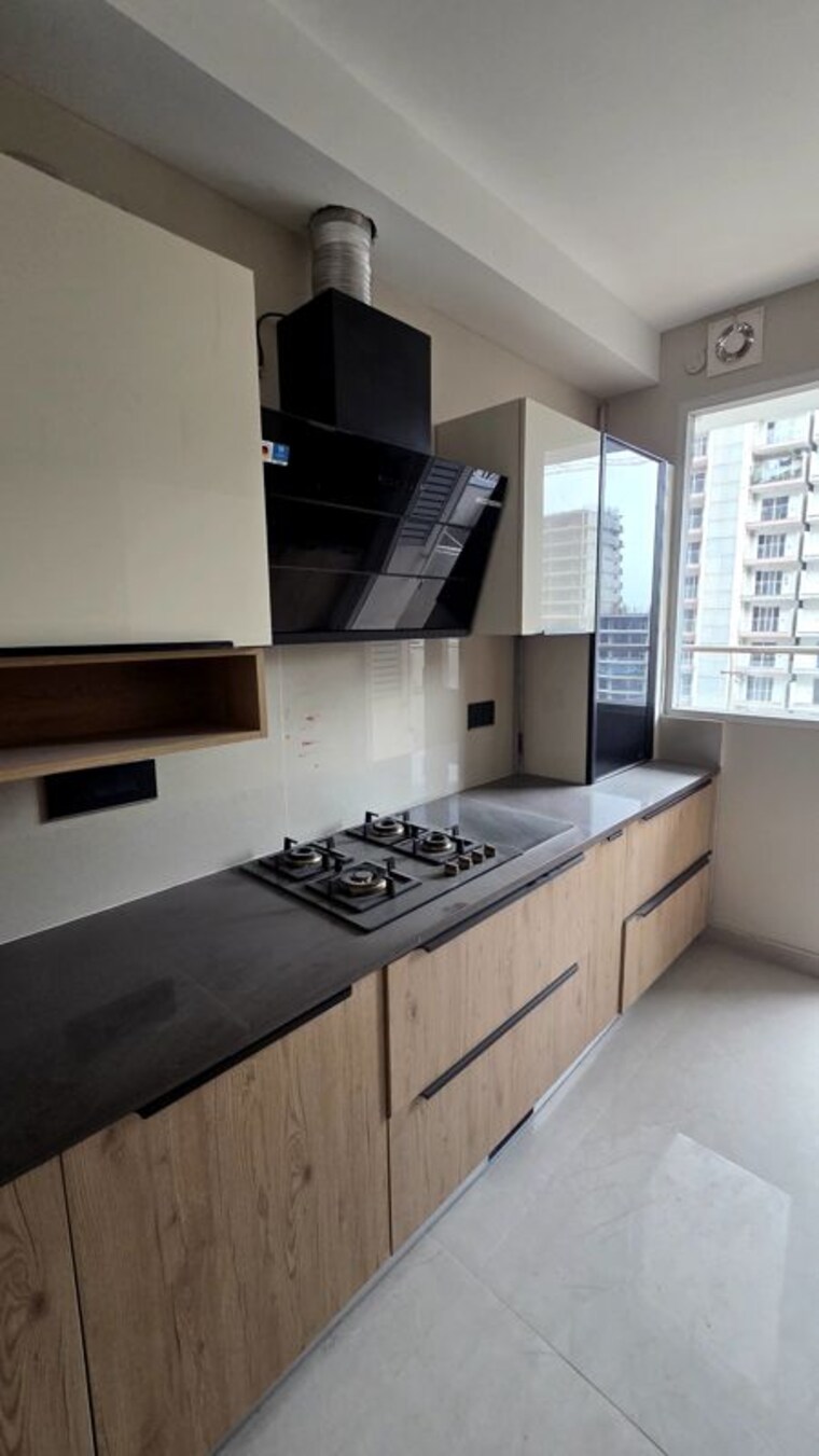 Kitchen, the-ananta-aspire 3 Bedroom 1843 Sq.Ft. Apartment In Utrathiya Zirakpur 10719316