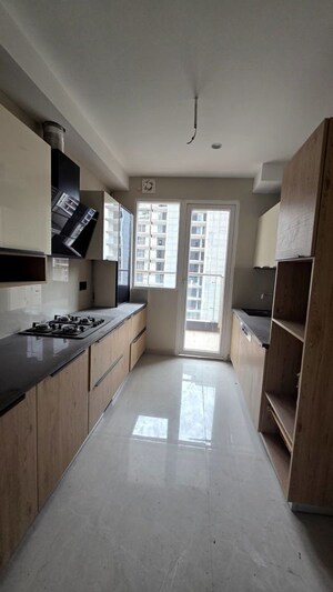 Kitchen in 3 BHK Apartment at The Ananta Aspire, Utrathiya – for Sale