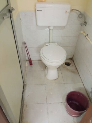 Bathroom in 1 BHK Apartment at Rehab Building, Andheri East – for Sale