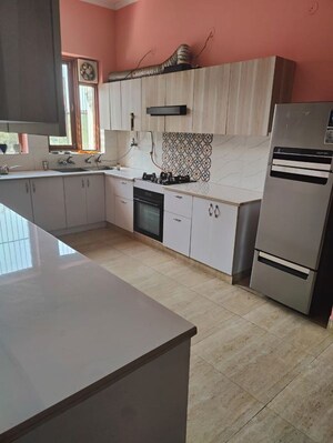 Kitchen in 6+ BHK Independent House at Jaypee Kensington Park Apartments, Sector 133 – for Sale