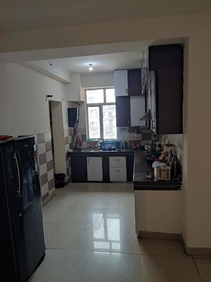 Kitchen in 2 BHK Apartment at Gaur Grandeur, Sector 119 – for Sale