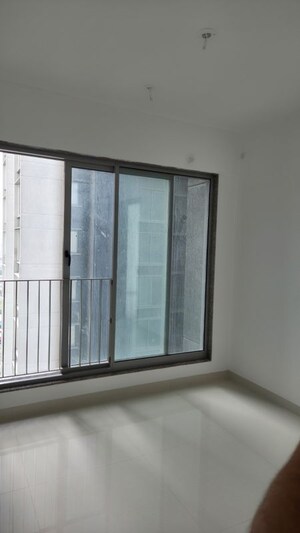 Room in 2 BHK Apartment at Sunteck City Avenue 4, Goregaon West – for Rent