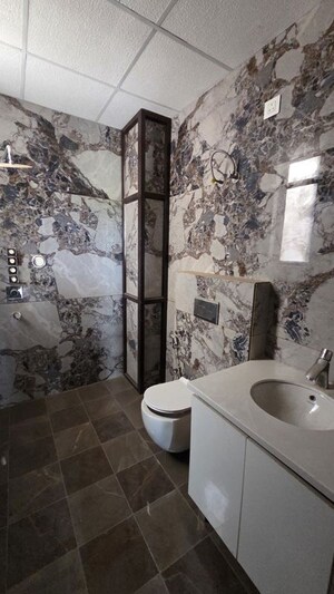 Bathroom in 5 BHK Apartment at Motia Aerogreens, Dyalpur – for Sale