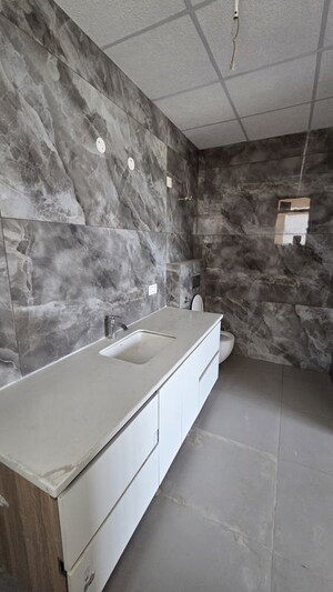 Bathroom in 5 BHK Apartment at Motia Aerogreens, Dyalpur – for Sale