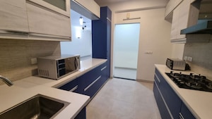 Kitchen in 3 BHK Apartment at Omaxe The Nile, Sector 49 – for Rent