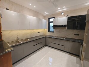 Kitchen in 4 BHK Builder Floor at Auram Floor, South City 2 – for Sale