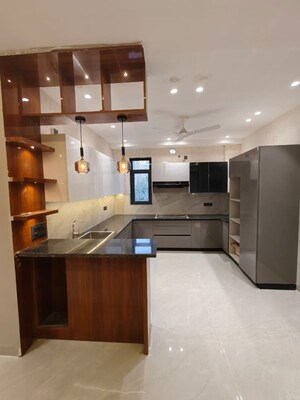 Kitchen in 4 BHK Builder Floor at Auram Floor, South City 2 – for Sale