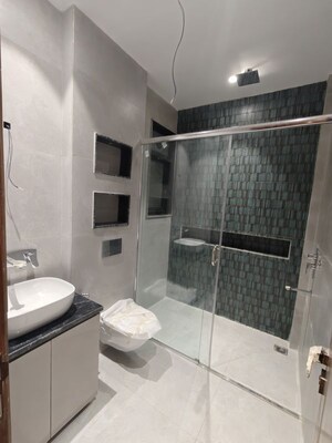 Bathroom in 4 BHK Builder Floor at Auram Floor, South City 2 – for Sale