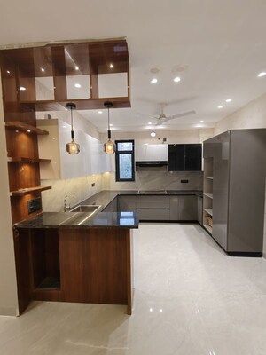 Kitchen in 4 BHK Builder Floor at Auram Floor, South City 2 – for Sale