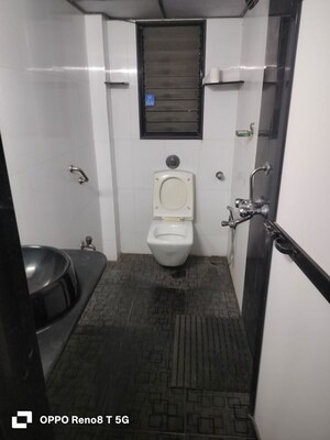 Bathroom in 2 BHK Apartment at Gypsy Rose Apartment, Andheri West – for Rent