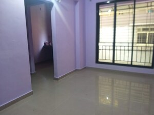 Living Room in 1 BHK Apartment at Krishnai Tower, Ghansoli – for Rent