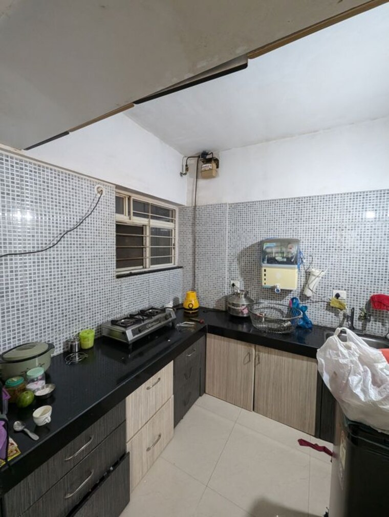 Kitchen, vijaylaxmi-river-residency 3 Bedroom 1004 Sq.Ft. Apartment In Chikhali Pune 10719951