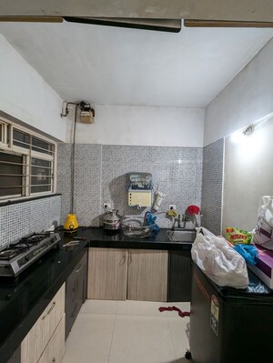Kitchen in 3 BHK Apartment at Vijaylaxmi River Residency, Chikhali – for Rent