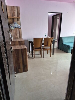 Living Room in 2 BHK Apartment at Kamal Van CHS, Kandivali West – for Sale