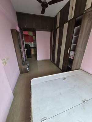 Master Bedroom in 2 BHK Apartment at Kamal Van CHS, Kandivali West – for Sale