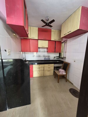 Kitchen in 2 BHK Apartment at Kamal Van CHS, Kandivali West – for Sale