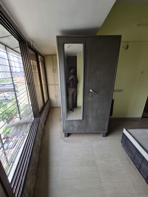 Room in 2 BHK Apartment at Kamal Van CHS, Kandivali West – for Sale