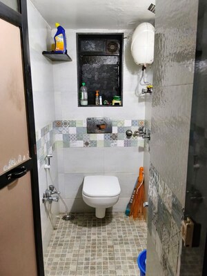 Bathroom in 2 BHK Apartment at Gauri Shankar CHS, Dombivli West – for Rent