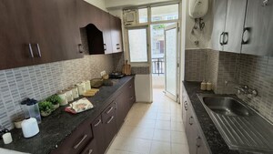 Kitchen in 3 BHK Apartment at Omaxe Palm Greens, Mu Greater Noida – for Sale