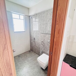 Bathroom in 2 BHK Apartment at Majestique Swapnangan, Dhayari – for Rent