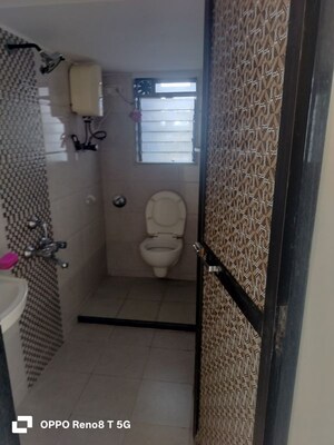Bathroom in 2.5 BHK Apartment at New Neelam CHS, Andheri West – for Rent