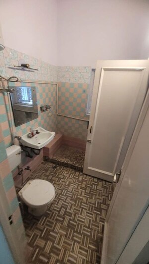 Bathroom in 3.5 BHK Builder Floor at Pamposh Enclave – for Rent