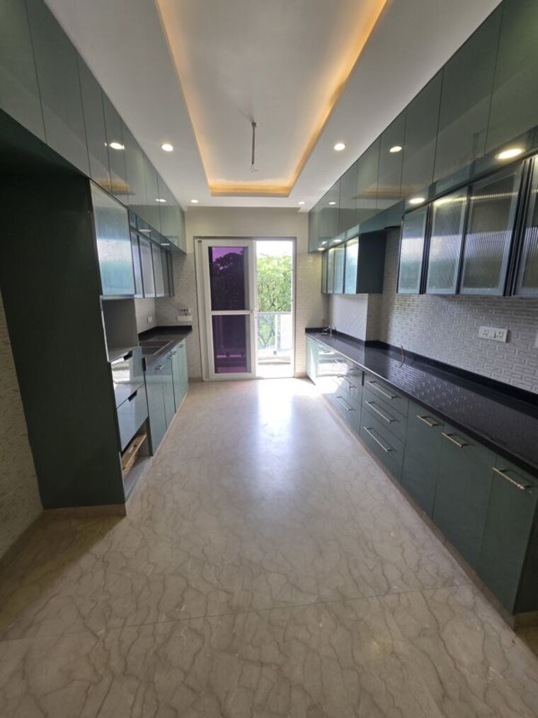 Kitchen, pushpanjali enclave 3 Bedroom 175 Sq.Yd. Builder Floor In Pushpanjali Enclave Delhi 10720247