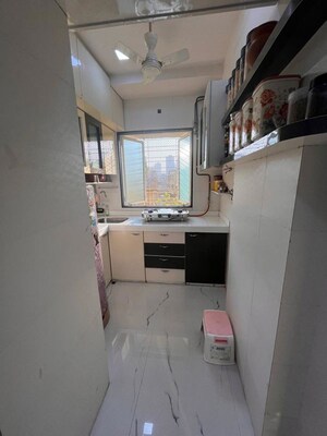 Kitchen in 2 BHK Apartment at Moonlight Apartment, Malad West – for Sale