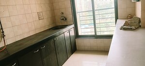 Kitchen in 2 BHK Apartment at Daffodil CHS, Malad West – for Rent