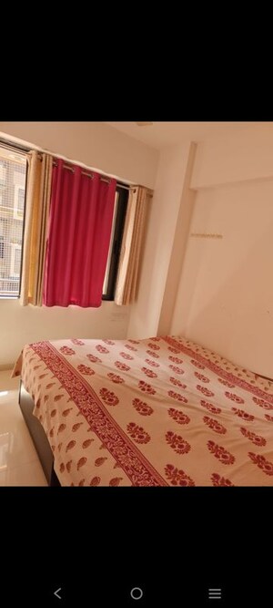 Bedroom in 2 BHK Apartment at Pavanj Parmeshwar Nilayam, Tragad – for Rent