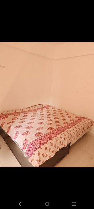 Bedroom in 2 BHK Apartment at Pavanj Parmeshwar Nilayam, Tragad – for Rent