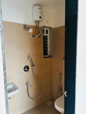 Bathroom in 1 BHK Apartment at Atmiya Centria, Santacruz East – for Rent
