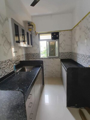 Kitchen in 1 BHK Apartment at DGS Sheetal Tapovan, Malad East – for Rent