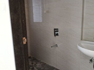 Bathroom in 2 BHK Apartment at Chandak 34 Park Estate, Goregaon West – for Rent